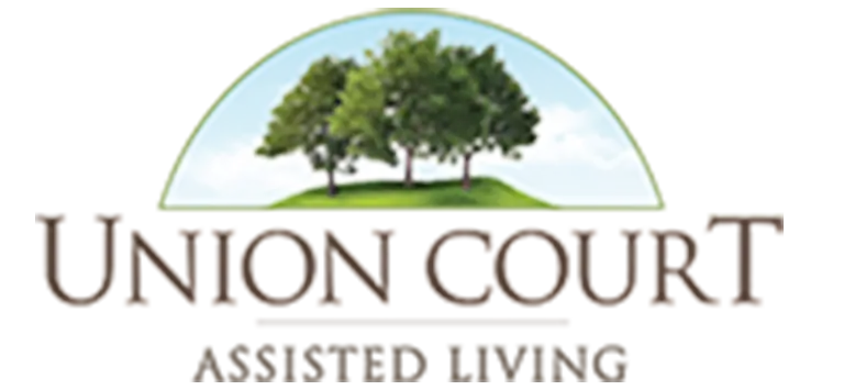 Logo with three trees on a green hill under a blue sky, above the text "Union Court Assisted Living, St. Charles" in large capital letters.
