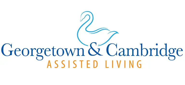 Logo for Georgetown & Cambridge Manors Assisted Living featuring a blue outline of a swan above the company name, with "Assisted Living" written in orange below.